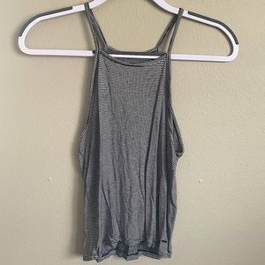 Size Medium, Color Black and White striped, Soft and Sexy fabric, Slight crop